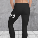 Black spandex stretch leggings with large Drag-On logo on thigh