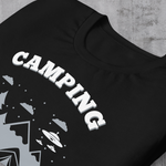 Black t-shirt with "Camping: It's like practice for the apocalypse" and graphic of tent, mountains, and evergreen trees.