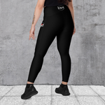 Woman in Spandex stretch black leggings with thigh pockets; "Stay strong and drag on" pocket graphic with red Oregon outline; high waist